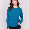 Peacock blue long-sleeve sweater with a crew neck and frayed rounded hem by Charlie B.