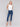 Five-pocket skinny leg indigo jeans with frayed hem detail by Charlie B.