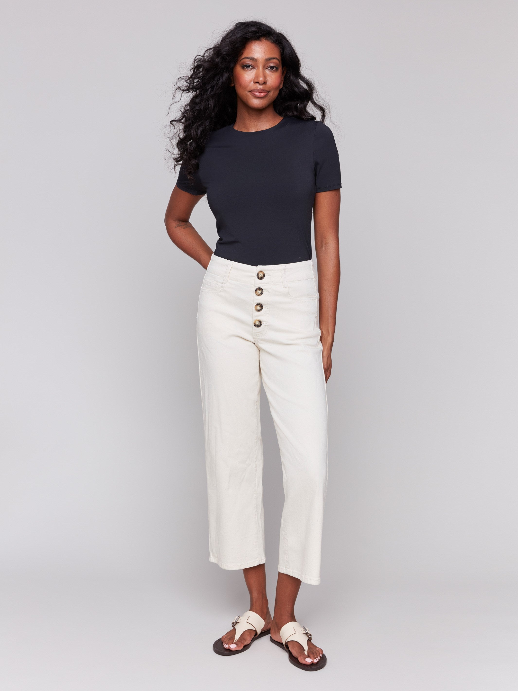 Natural color crop twill pants with a five-pocket design by Charlie B.