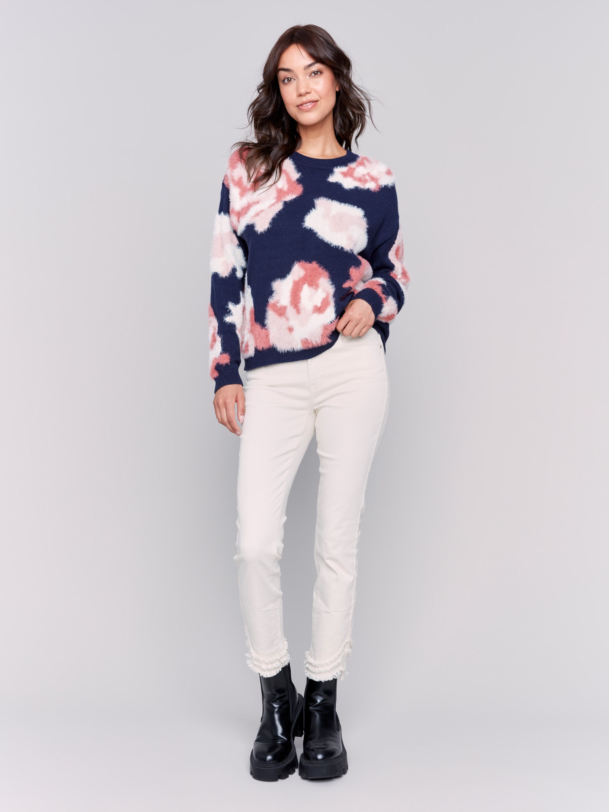 Navy fuzzy jacquard knit sweater with a floral pink pattern, featuring a crew neck and drop-shoulder design by Charlie B.