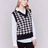 Black and white houndstooth fooler vest with v-neck and poplin shirt collar, hem, and sleeves by Charlie B.