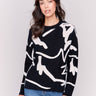 Black and white abstract Jacquard Ottoman Cotton Sweater by Charlie B, featuring a comfortable crew neck and stylish pattern.