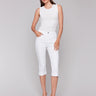 White knee-high capri pants featuring a regular rise by Charlie B.