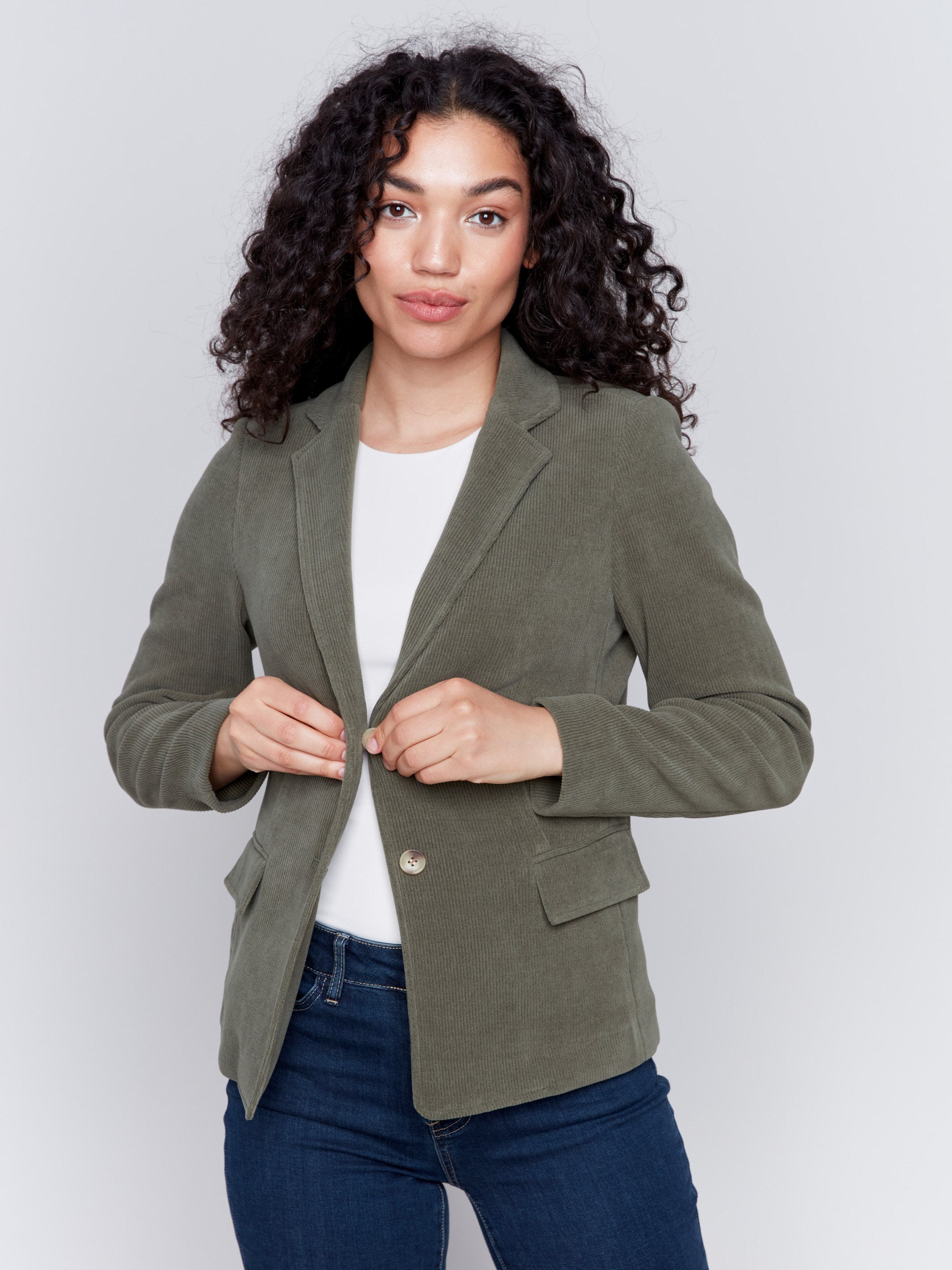 Olive green corduroy blazer with a single-button closure and flap pockets by Charlie B.