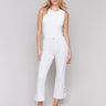 Ankle-length white pants with lace cuts and stretch twill by Charlie B.