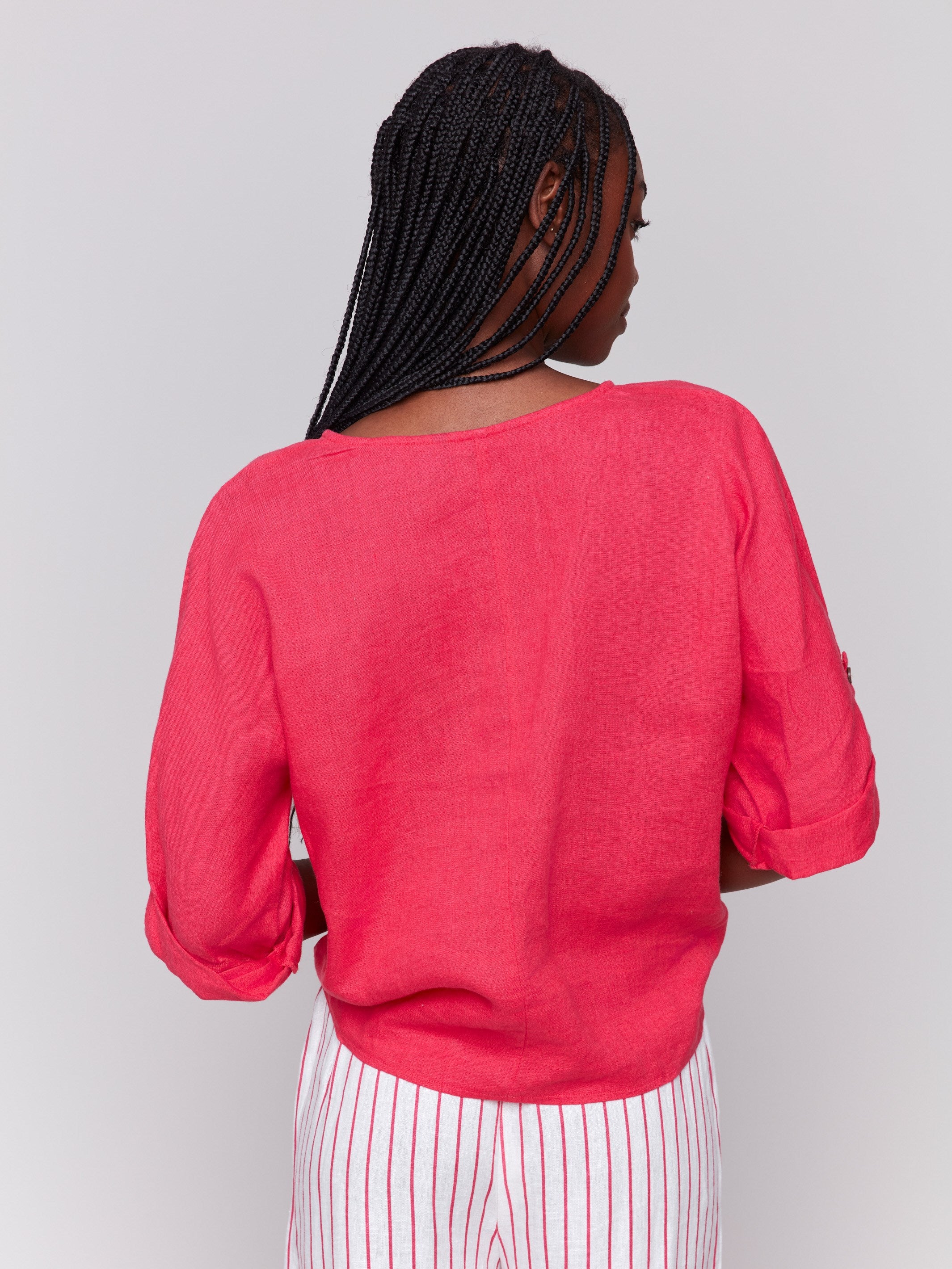 Elegant roll-up 3/4 sleeves enhance this linen blend top by Charlie B.