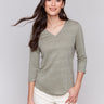 Celadon top with neck trim detail, crafted from a linen blend by Charlie B.