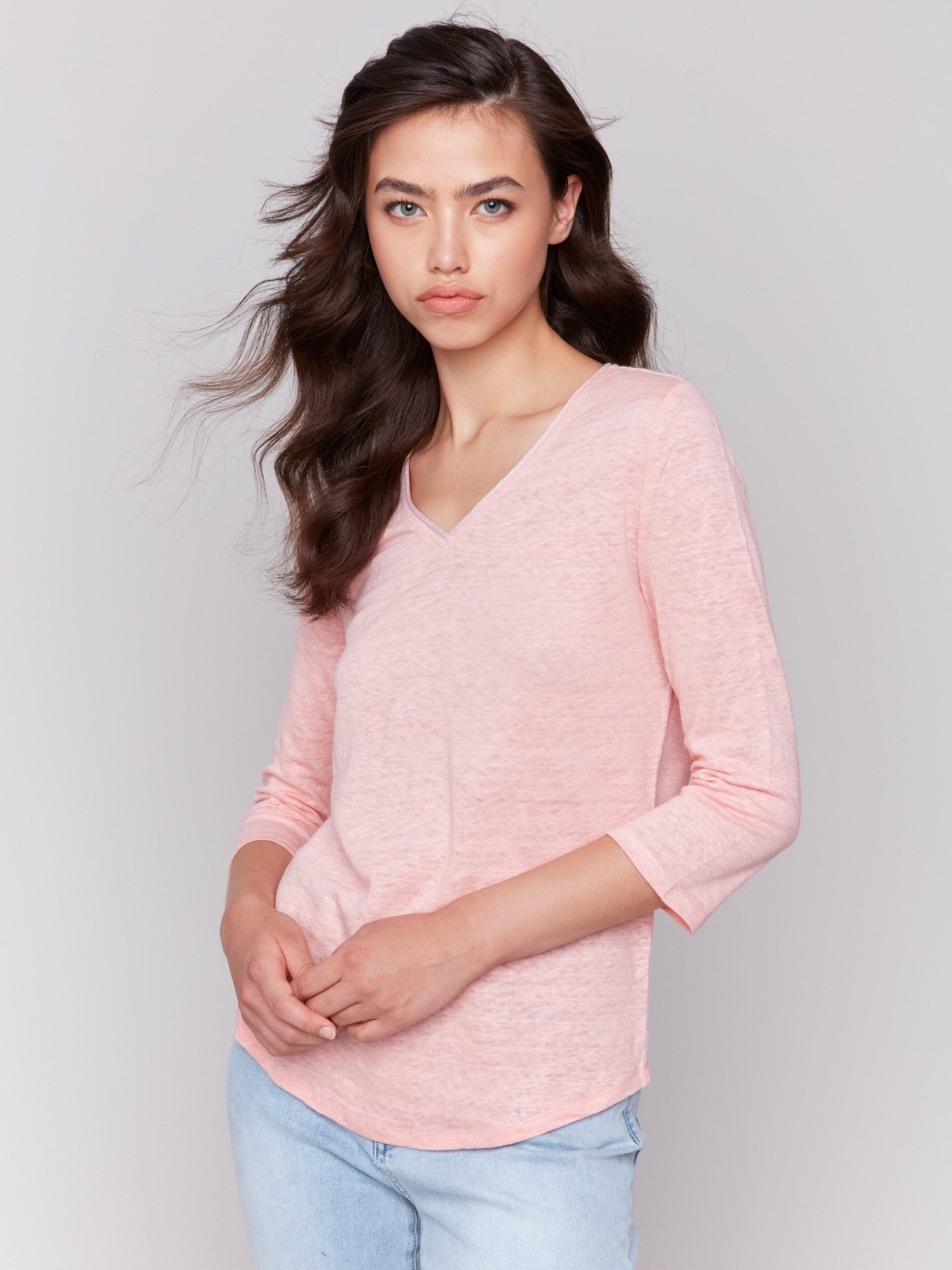 Guava V-neck top with 3/4 sleeves, made from a linen blend with neck trim detail, by Charlie B.