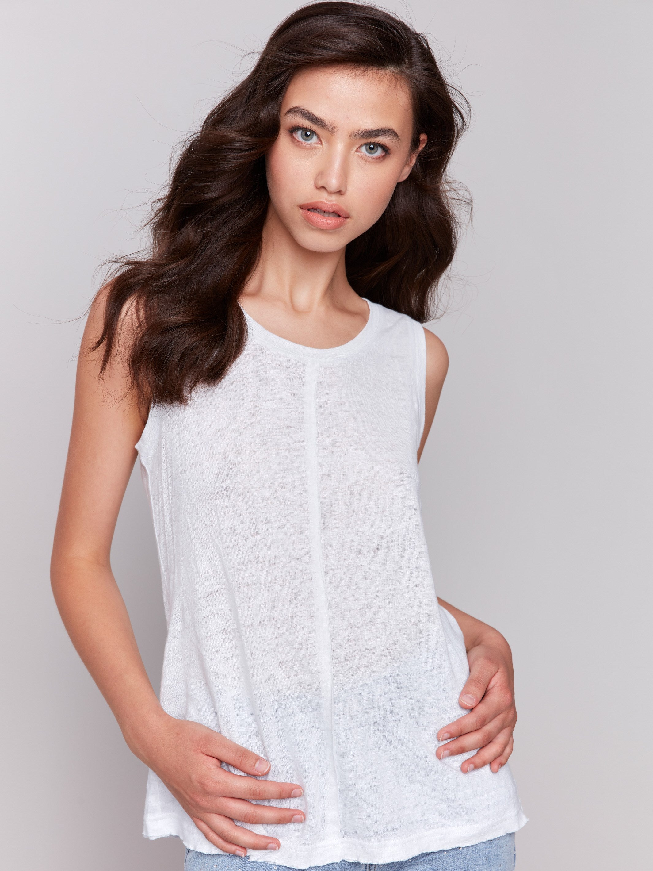 Stylish white top crafted from a comfortable linen blend by Charlie B.