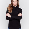 Elegant black long-sleeve sweater with cowl neck and side seams forward design by Charlie B.