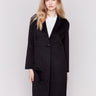 Black long double-faced wool coat with a minimalist design, single-breasted front, and sleek button closure by Charlie B.