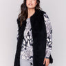 Black faux fur long vest without closure, featuring a soft and luxurious texture, perfect for a stylish and cozy look by Charlie B.