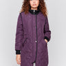 Plum purple long quilted puffer jacket with rib knit detail, zipper front, and front pockets by Charlie B.