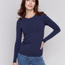 Navy blue long-sleeve top with crew neckline, featuring a fitted silhouette by Charlie B.