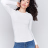 Natural white long-sleeve top with crew neckline, featuring a fitted silhouette by Charlie B.