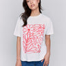 White t-shirt with a crew neckline and pink graphic by Charlie B.