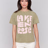 Celadon green t-shirt with crew neckline and pink graphic by Charlie B.