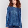 Blue metallic cable knit sweater with long sleeves and a crew neckline by Charlie B.