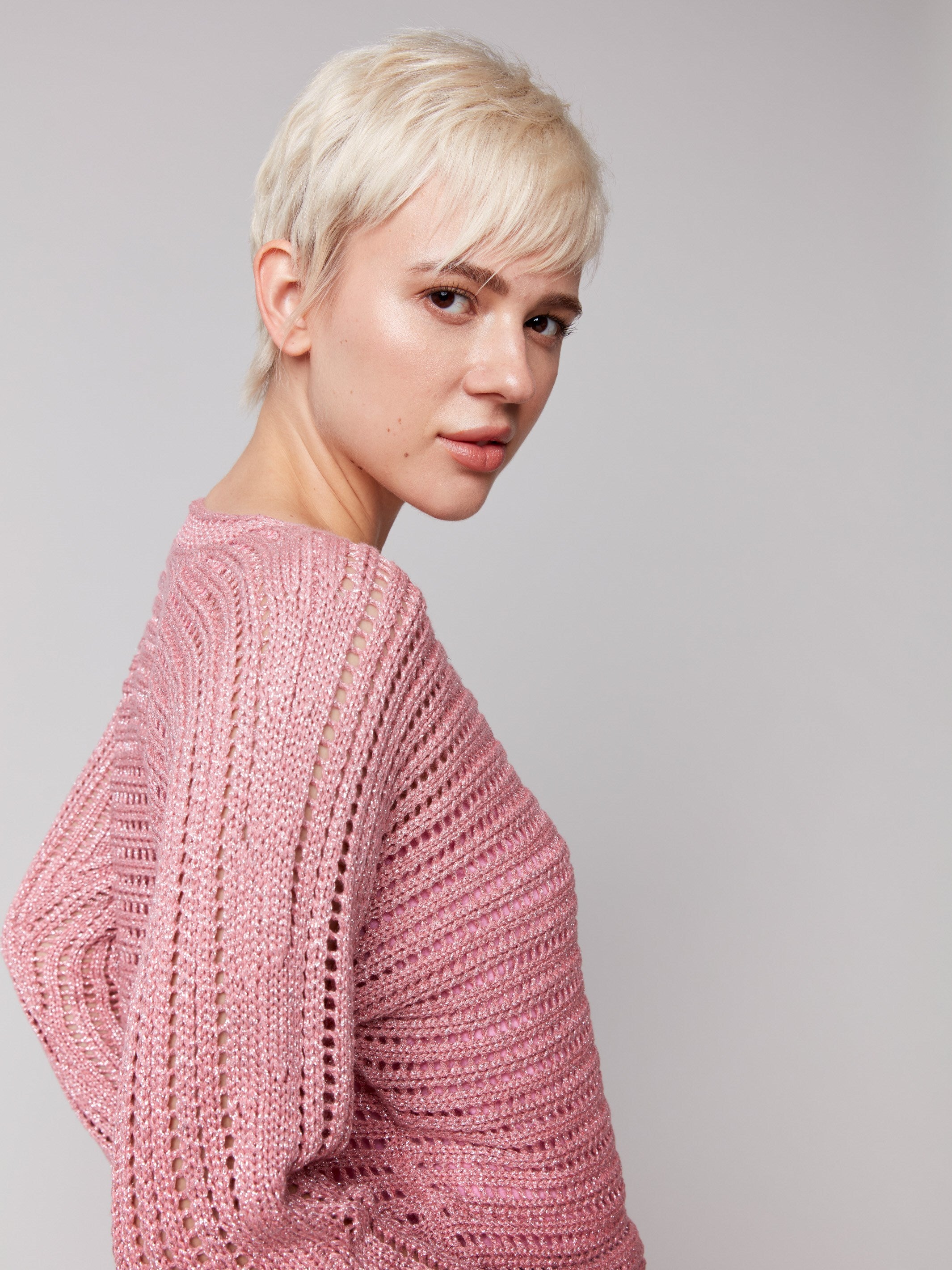 Pink crew neck sweater with a metallic sheen by Charlie B.