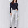 Silver metallic flared pants with welt front pockets and zipper closure by Charlie B.