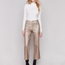 Bronze metallic flared pants with welt front pockets and zipper closure by Charlie B.