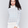 Women's frost blue jacquard knit turtleneck sweater with long sleeves in a cool color palette by Charlie B.