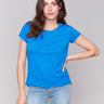 Organic cotton t-shirt with a crew neckline, coastal blue color by Charlie B.