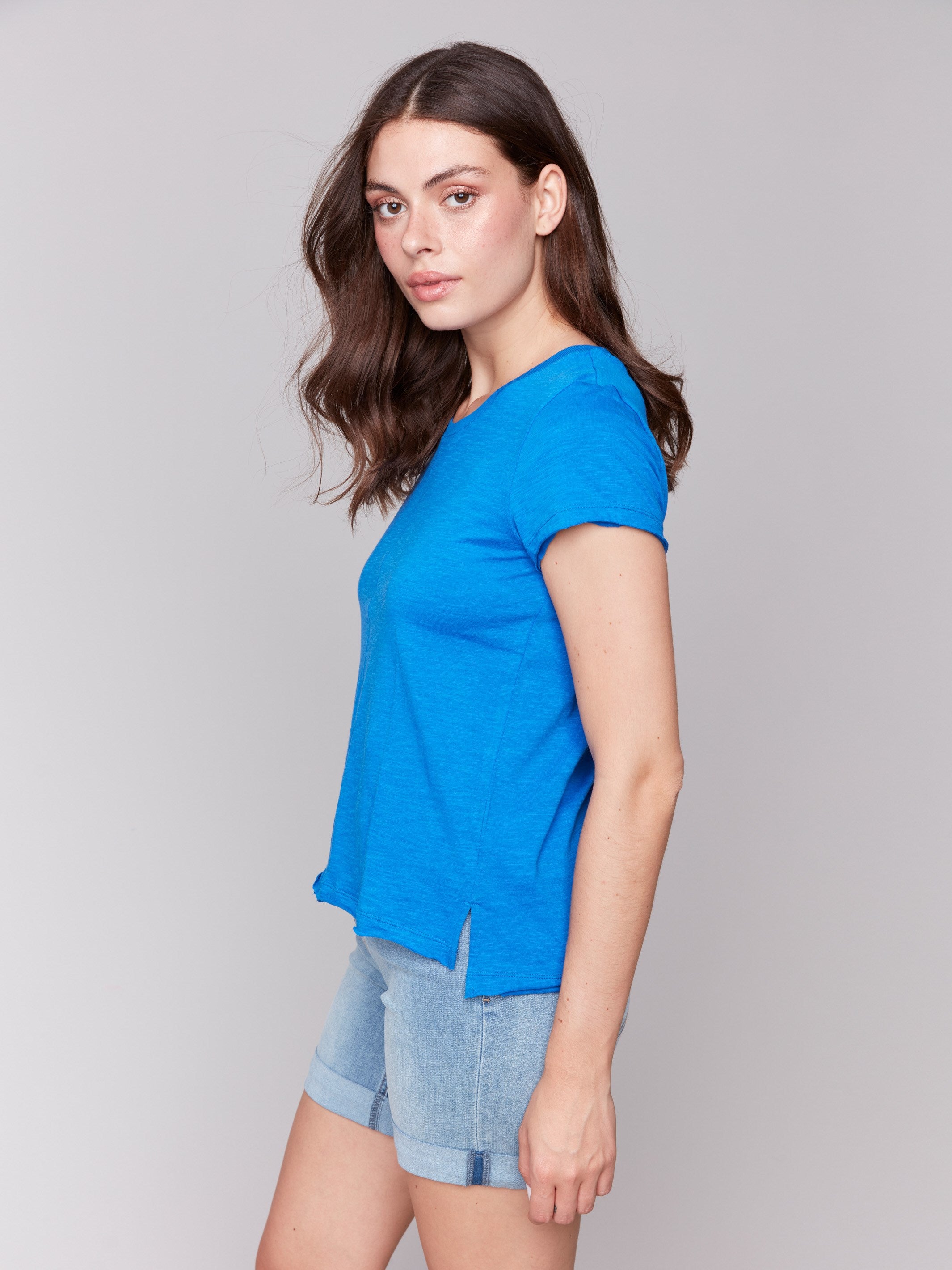 Coastal blue tee with stylish side slits made from organic cotton by Charlie B.