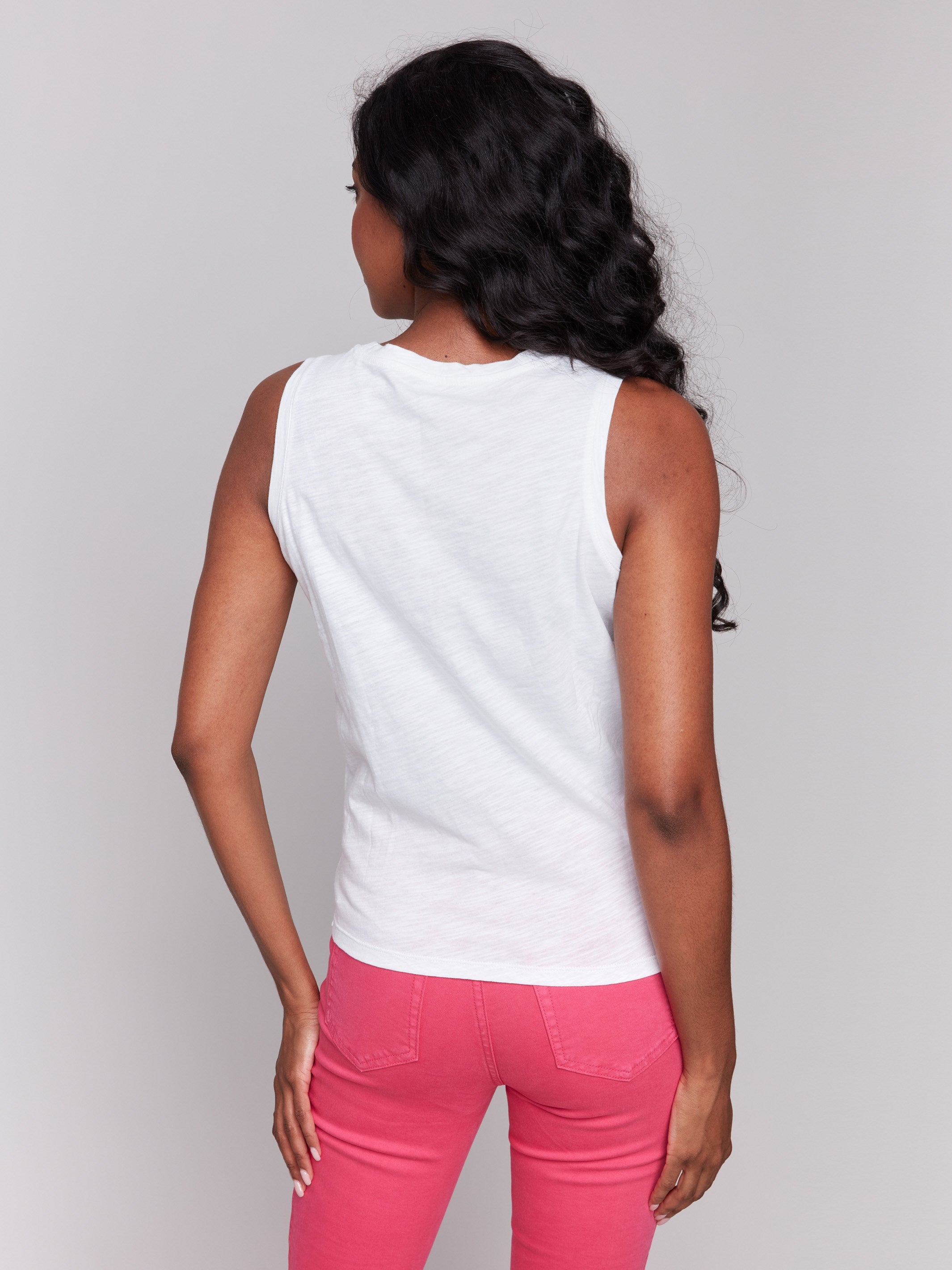 White organic cotton tank top with knot detail by Charlie B, designed for comfort and style.