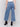 Medium blue jeans with front patch pockets and a flared leg, featuring a mid-rise by Charlie B.