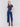 Indigo blue jeans with front patch pockets and a flared leg, featuring a mid-rise by Charlie B.