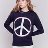 Navy blue sweater featuring a large peace sign graphic on the front with blanket stitch detailing, long sleeves, and crew neckline by Charlie B.