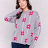 Heather grey sweater with pink floral print and a round neckline by Charlie B.