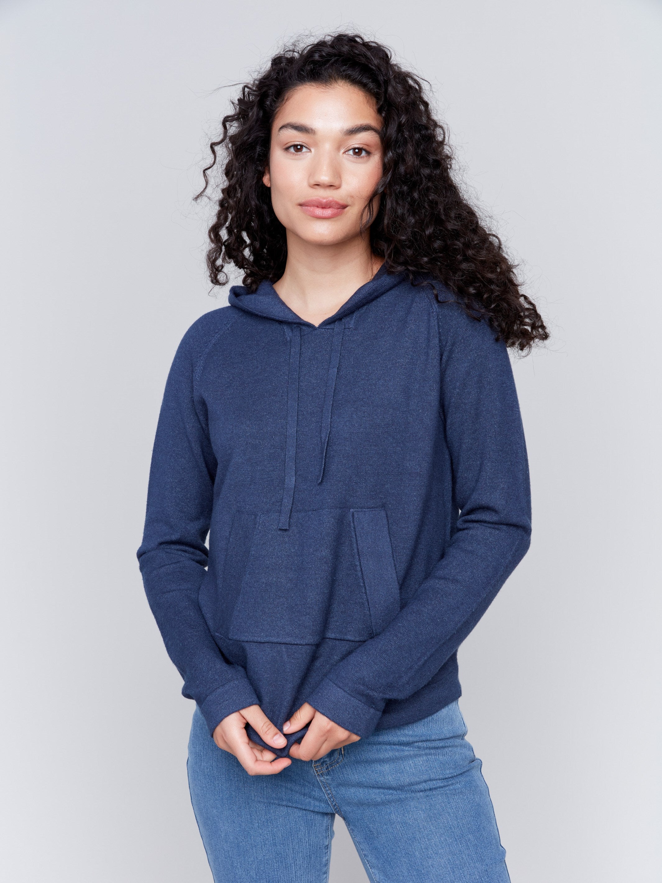 Denim blue knit hoodie sweater with long sleeves and front pocket by Charlie B.