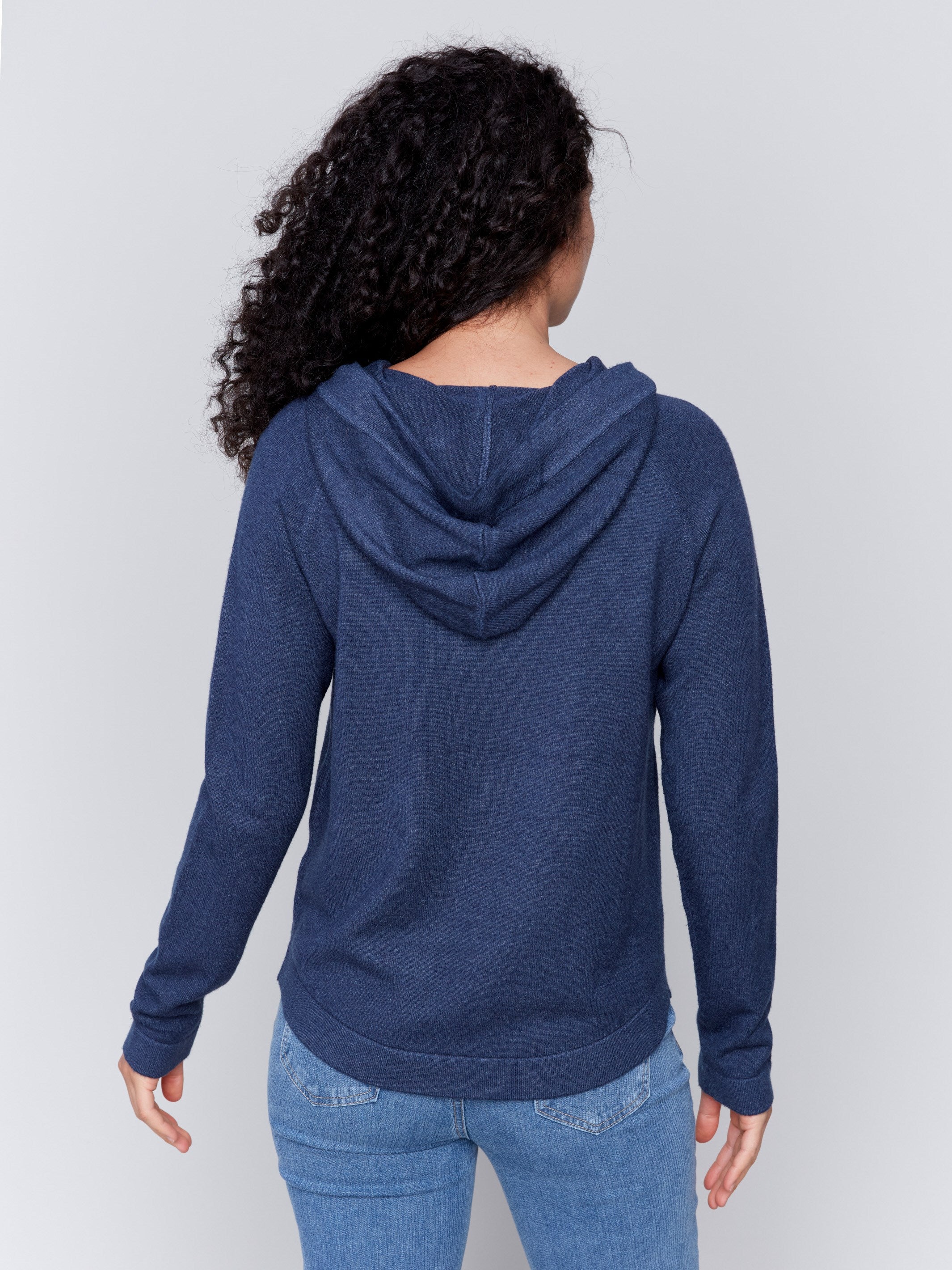 Denim blue knit hoodie sweater with long sleeves and front pocket by Charlie B.