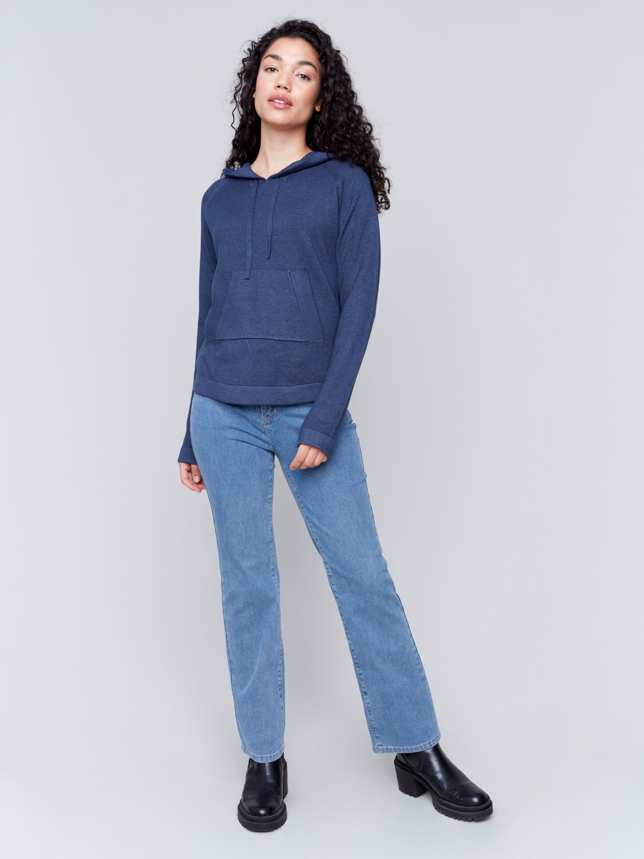 Denim blue knit hoodie sweater with long sleeves and front pocket by Charlie B.