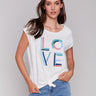 Top with a round neckline and colorful 'LOVE' print by Charlie B.