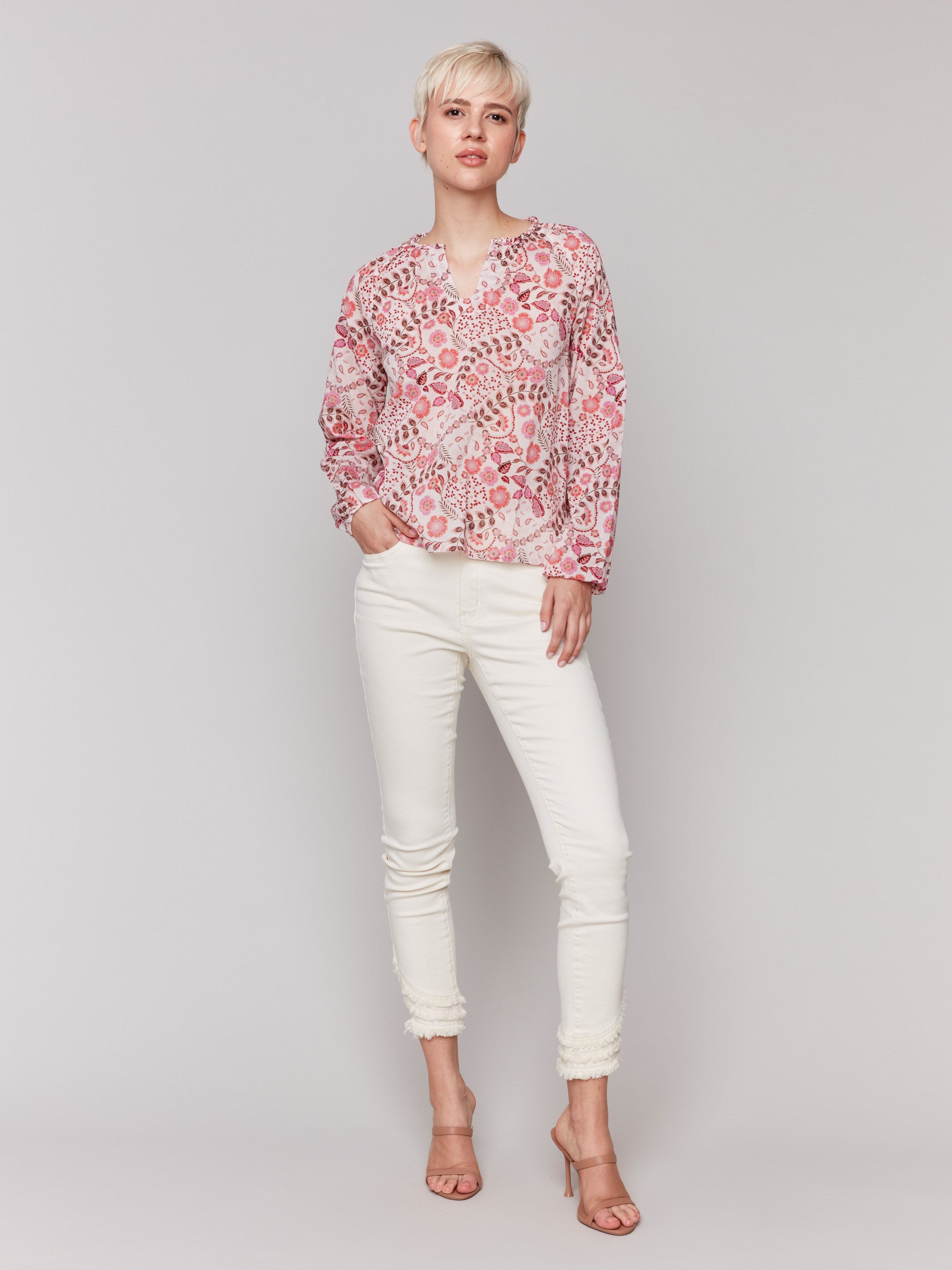 Blouse featuring twisted detail at neck by Charlie B.