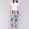 Floral-printed jogger pants with a relaxed fit and stretch fabric by Charlie B.