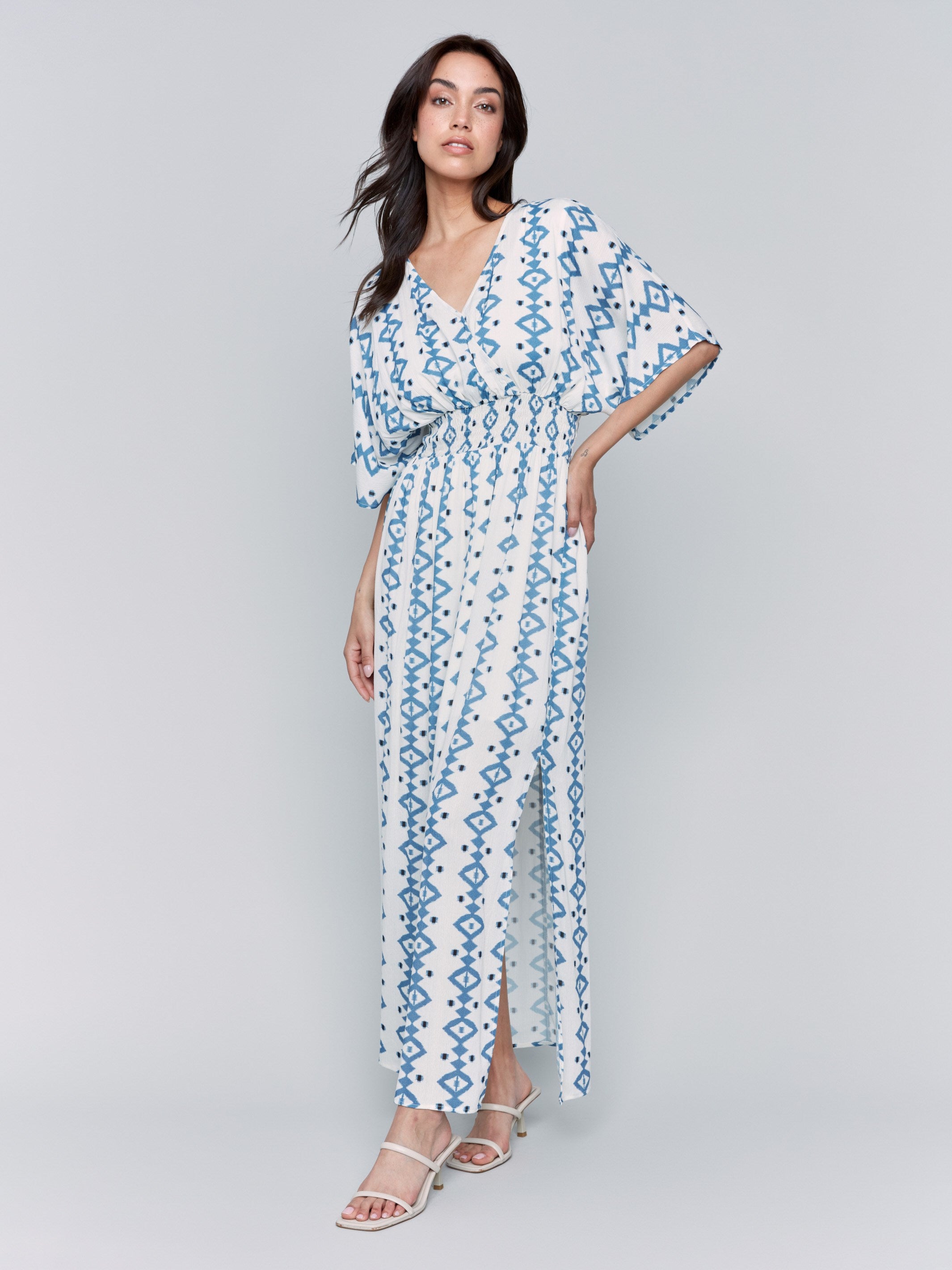 Maxi dress featuring dolman sleeves and geometric pattern by Charlie B.