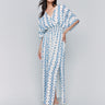 Maxi dress featuring dolman sleeves and geometric pattern by Charlie B.