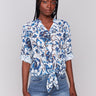 V-neckline blue floral blouse with eyelet fabric by Charlie B.