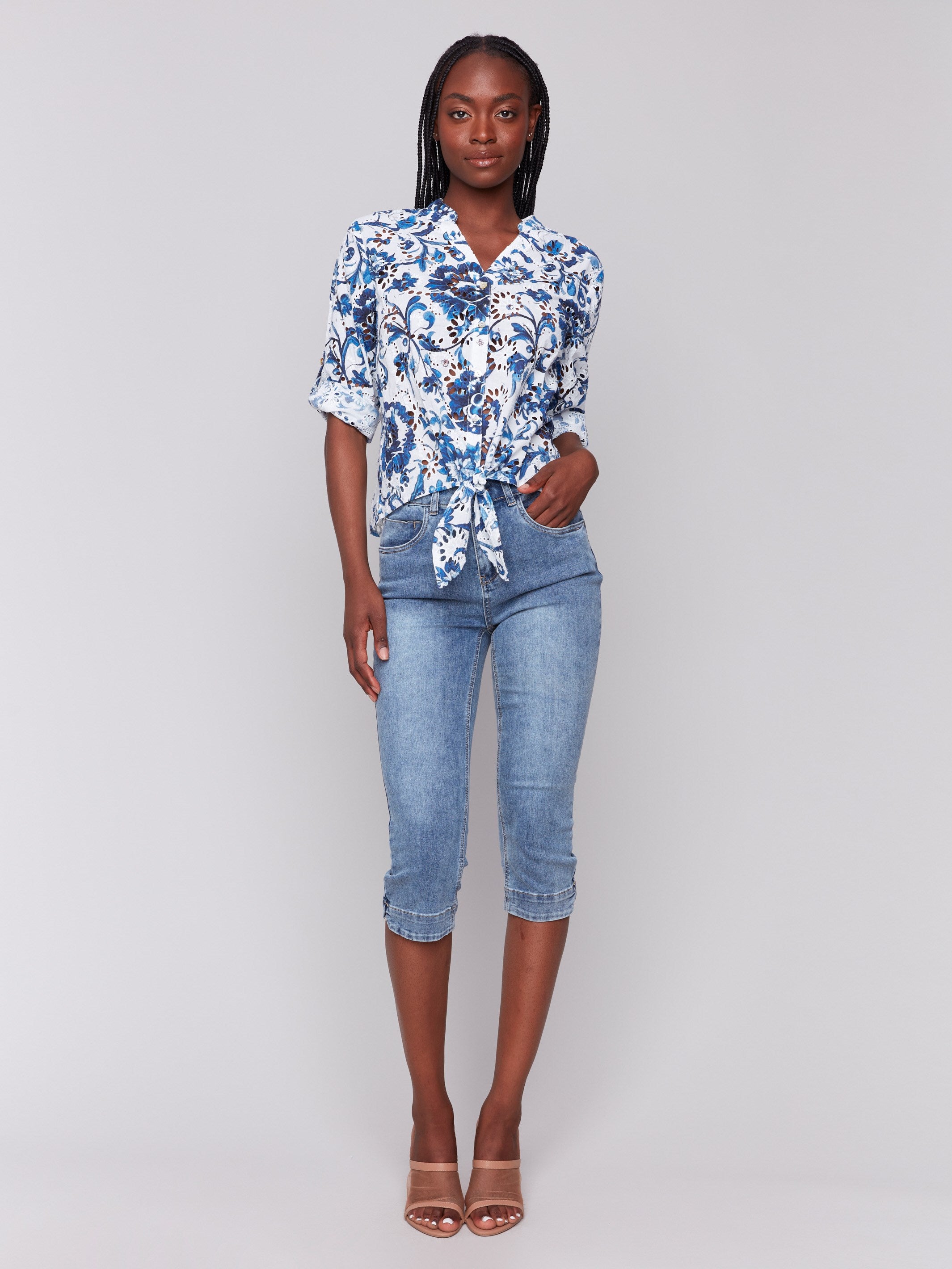 3/4 roll-up sleeves on a floral eyelet blouse by Charlie B.