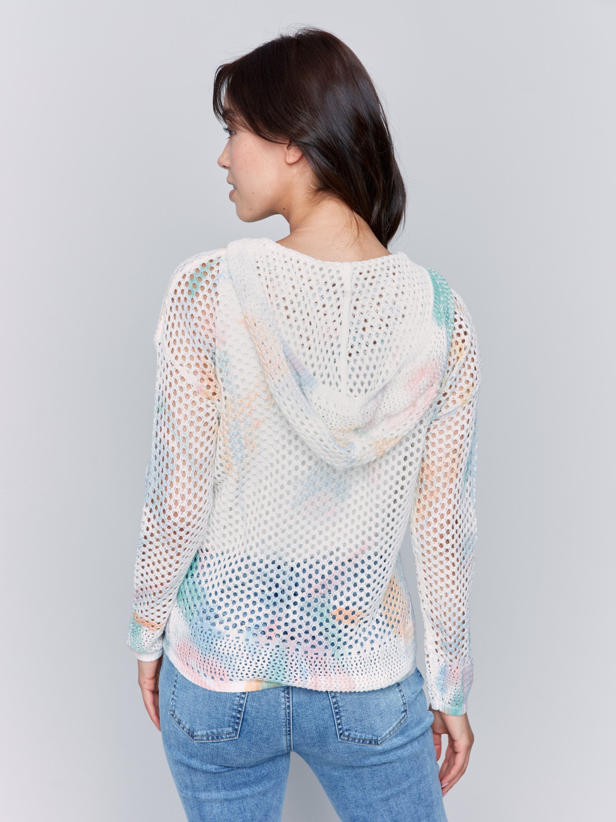 Pastel-themed hoodie featuring intricate crochet details by Charlie B.