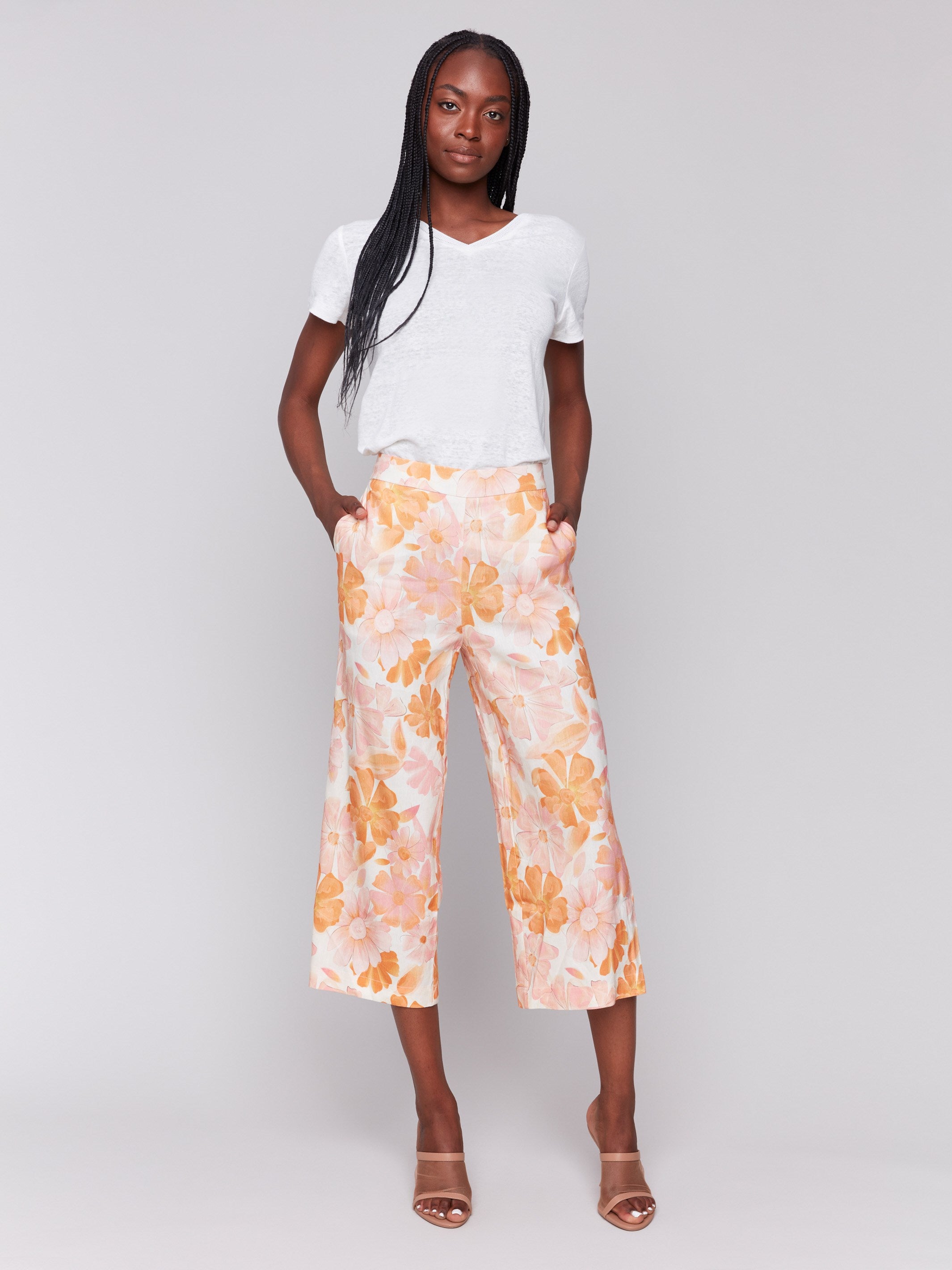 High-rise waist floral linen pants with a stretch fabric for comfort by Charlie B.