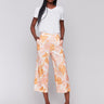 High-rise waist floral linen pants with a stretch fabric for comfort by Charlie B.