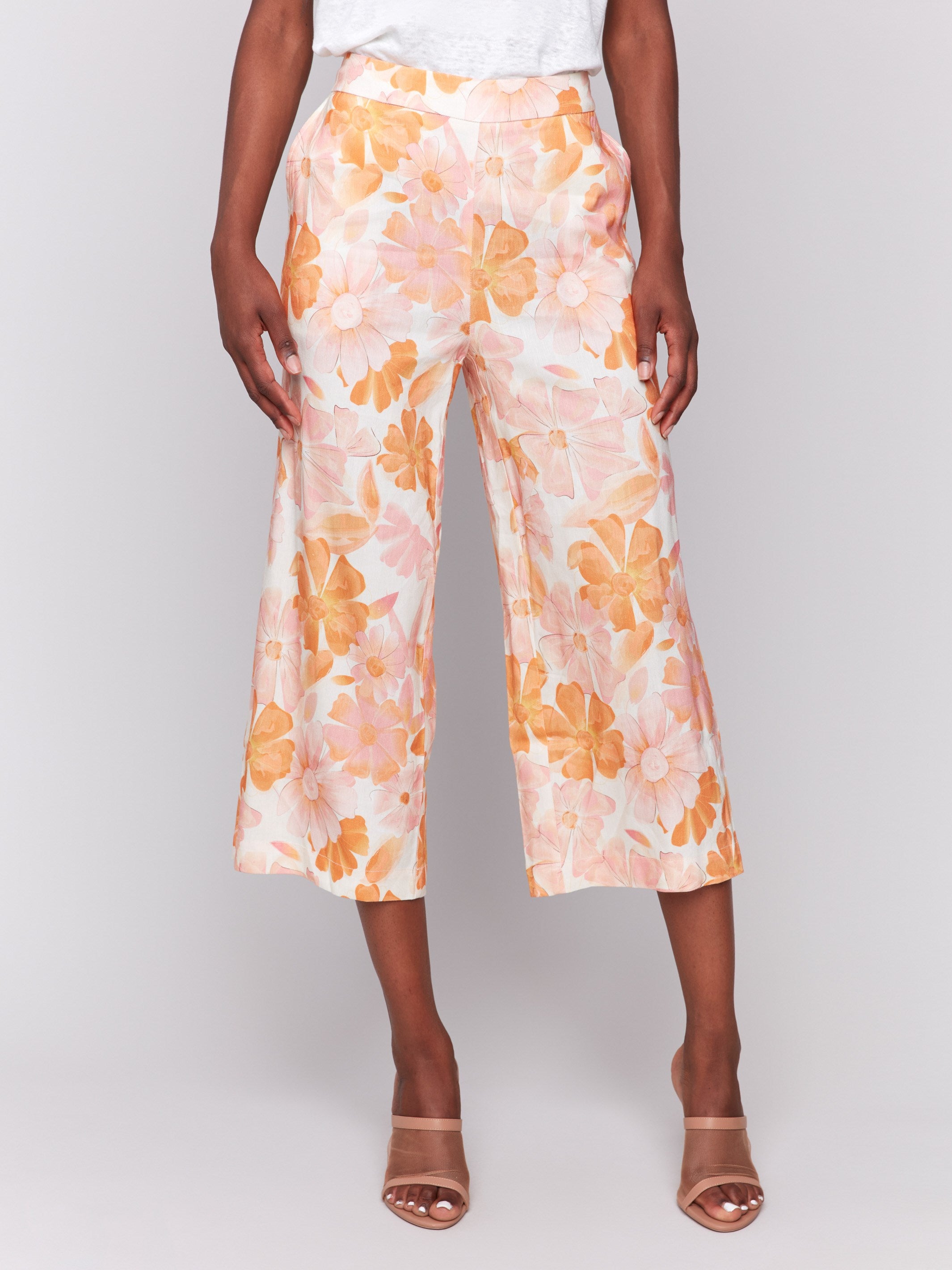 Pull-on design floral cropped pants featuring wide leg style by Charlie B.