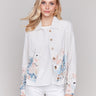 White jacket with a shirt collar and multicolor floral accents by Charlie B.