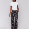 Black and white pants with a geometric pattern and wide-leg design by Charlie B.