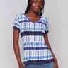 Women's V-neck T-shirt with tie-dye pattern in blue and white by Charlie B.